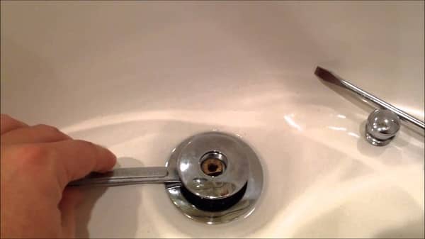 How to remove stopper from bathroom sink