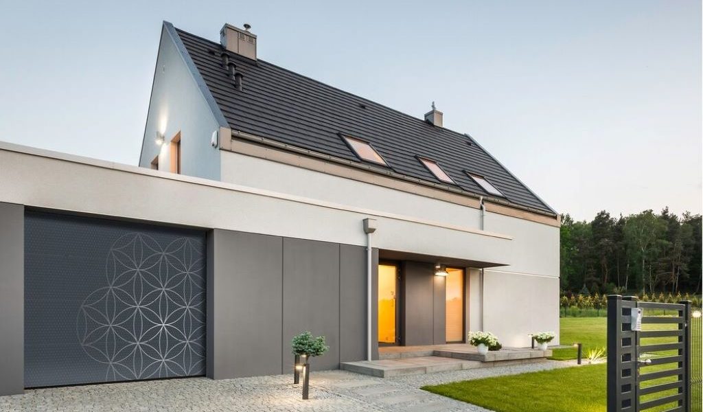 Modern UK garage door with bold colors and sleek metallic finishes enhancing home exterior design