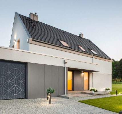 Modern UK garage door with bold colors and sleek metallic finishes enhancing home exterior design
