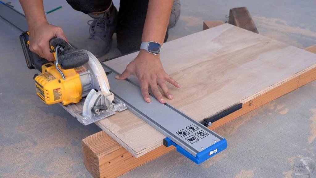 Hands adjusting bevel angle on a lightweight circular saw, highlighting ergonomic grip and precision markings for beginner users.