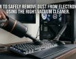 Handheld vacuum cleaning a mechanical keyboard with article title overlay for electronic safety.
