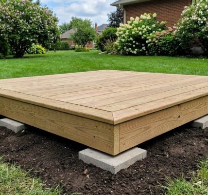 Backyard platform sinking into clay soil in Denver residential yard
